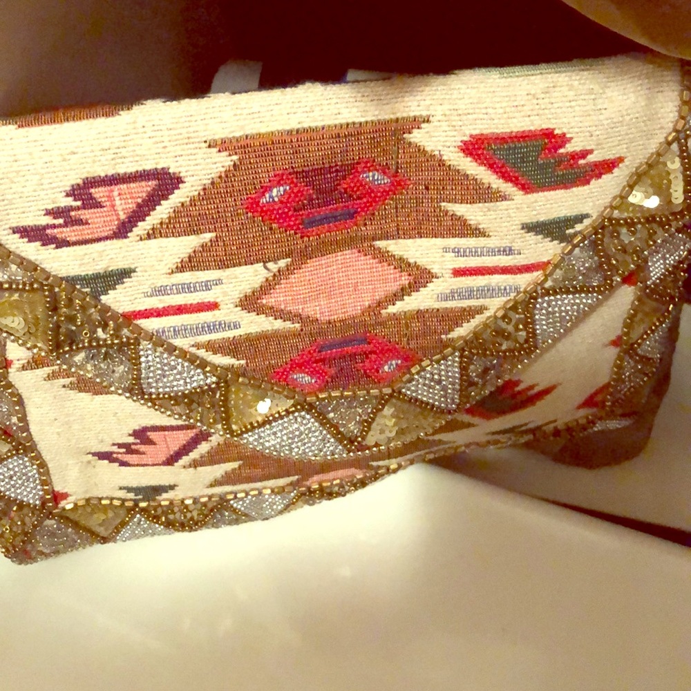 Aztec design clutch with sparkle